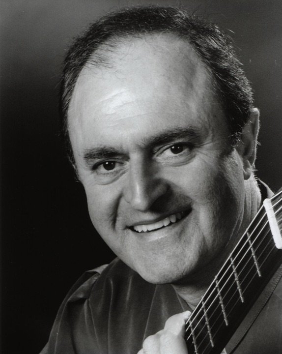 Julian Byzantine smiling, holding his guitar